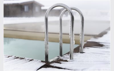 Seasonal Pool Chemical Maintenance: Summer vs. Winter